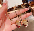 Golden Heart Hoop Earrings.