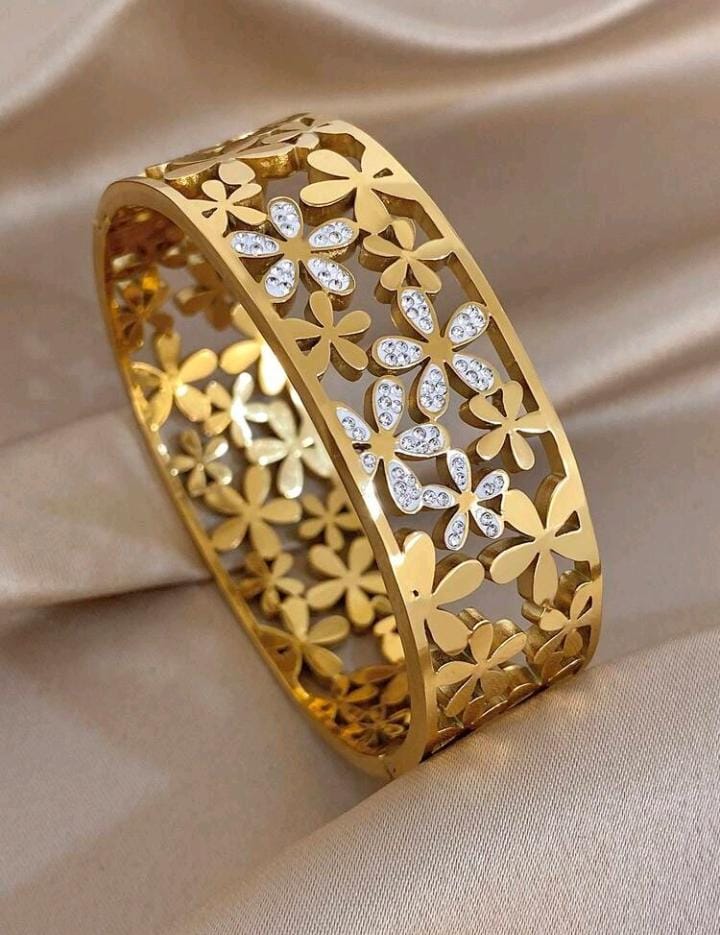 Gold Plated Wide Floral Cutout Bangle with Crystal Studs.