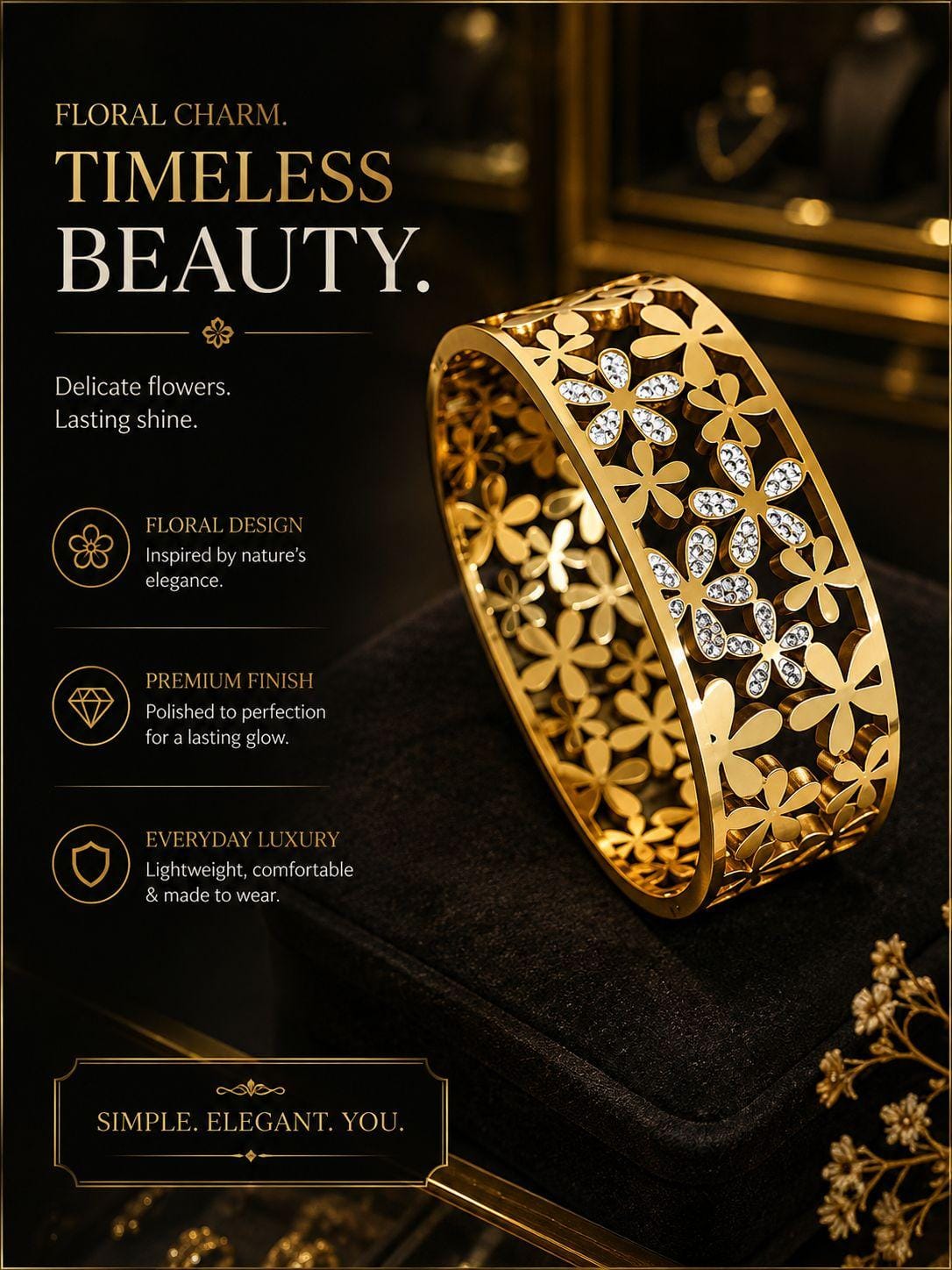 Gold Plated Wide Floral Cutout Bangle with Crystal Studs.
